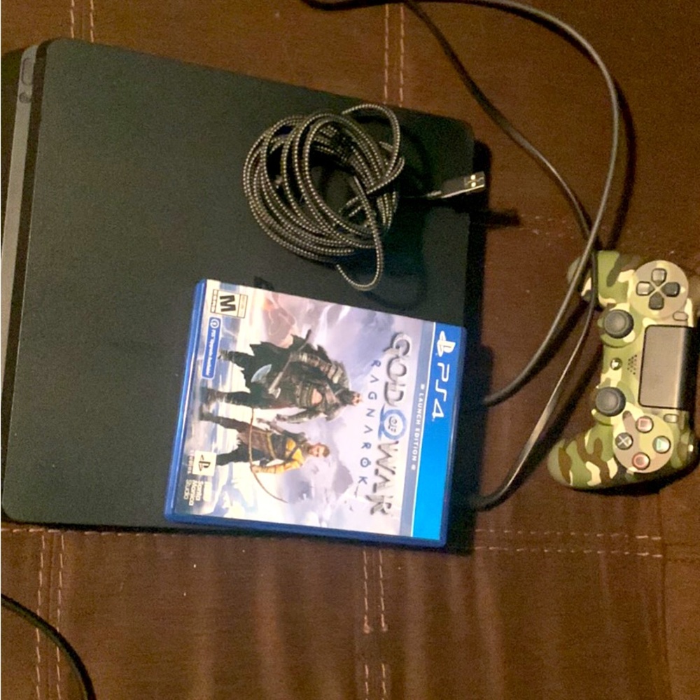 Ps4 slim 500gb with a controller and charger and with ragnarok with cables
